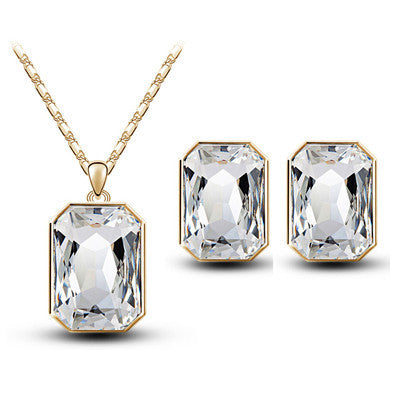 Crystal Pendant Necklace for Women elegant Statement Jewelry featuring a gold chain and matching earrings