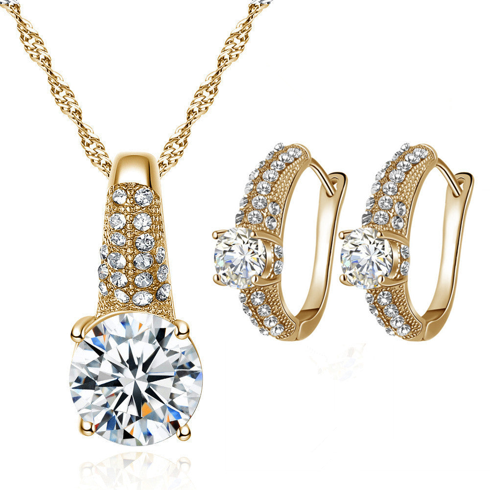 Bridal Jewelry Set Necklace Earrings Gold Silver with sparkling gemstones for elegant wedding day look.