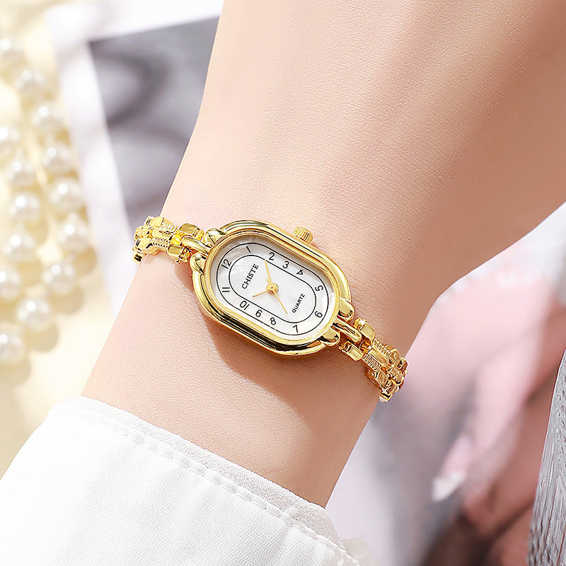 Women's Oval Bracelet Watch Retro Chinese Style Gold Quartz